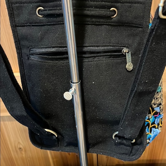 Vibrant Multi-Color Embroidered Backpack with Bird and Floral Design - Picture 10 of 12